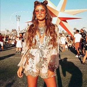 Long sleeve coachella romper with pink sequins.